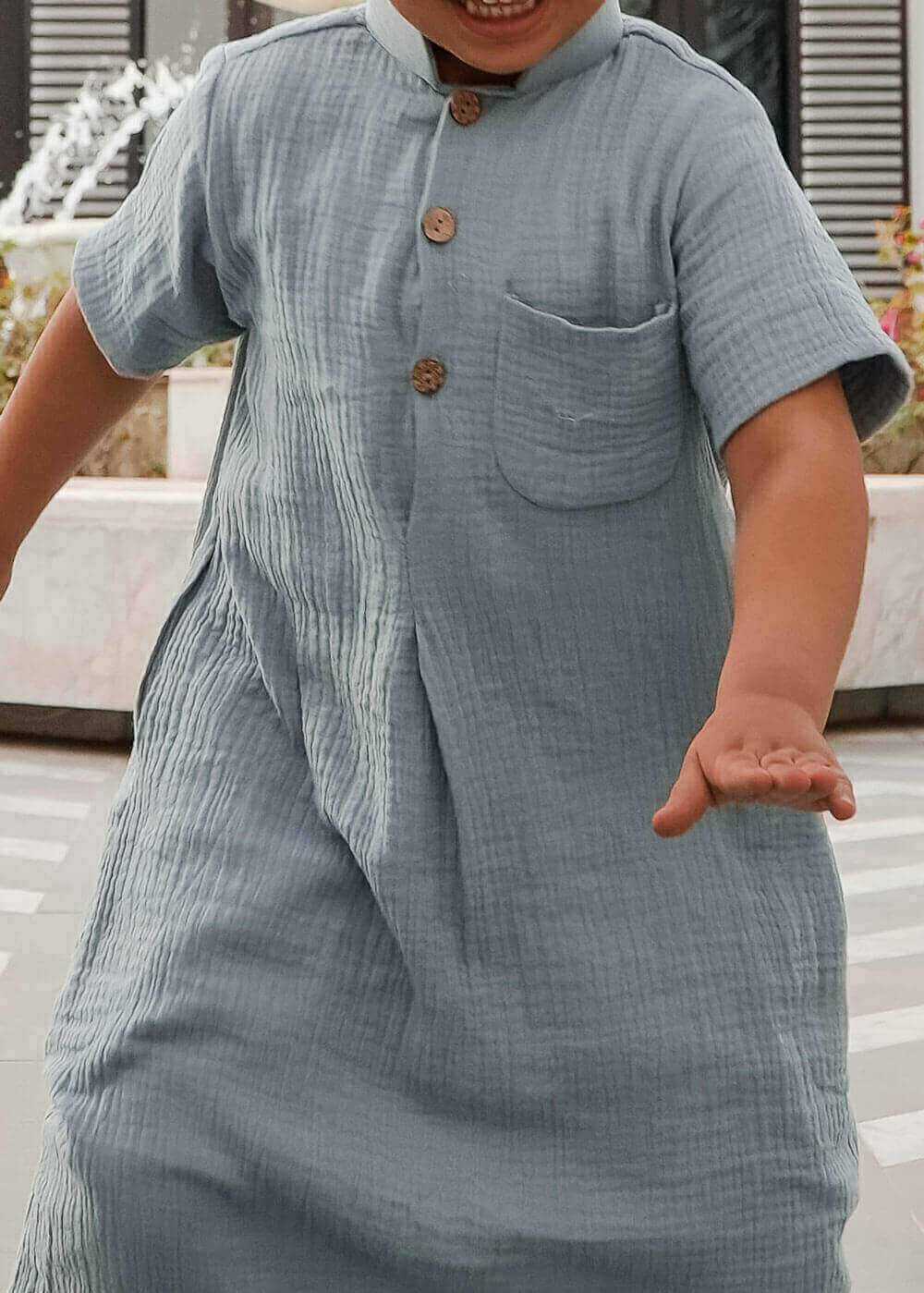 دشداشة موسلين زرقاء للأولاد