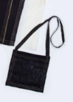 صورة فيست قرقيعان أسود مع حقيبة ولادي