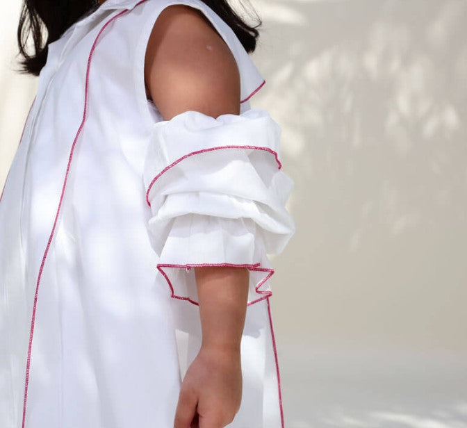 White And Fuchsia Piping With Shoulder Cut Dress For Newborn