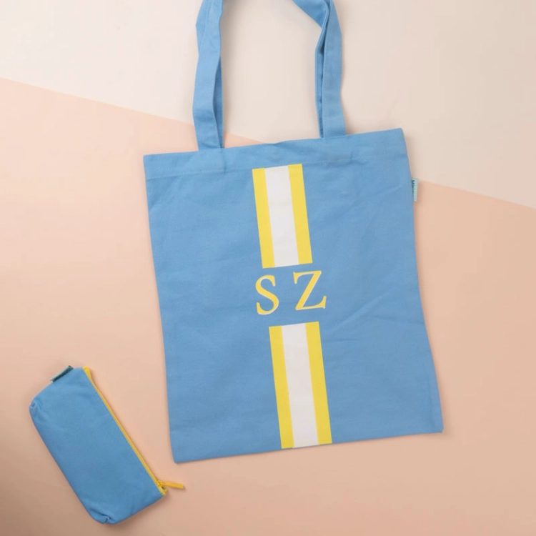 Picture of Set Of Sky Blue Shoulder Bag With Pouch (With Alphabet Printing)