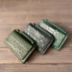 صورة حقيبة مخلب الأخضر الغامق جلد التمساح من لولوه الخطاف