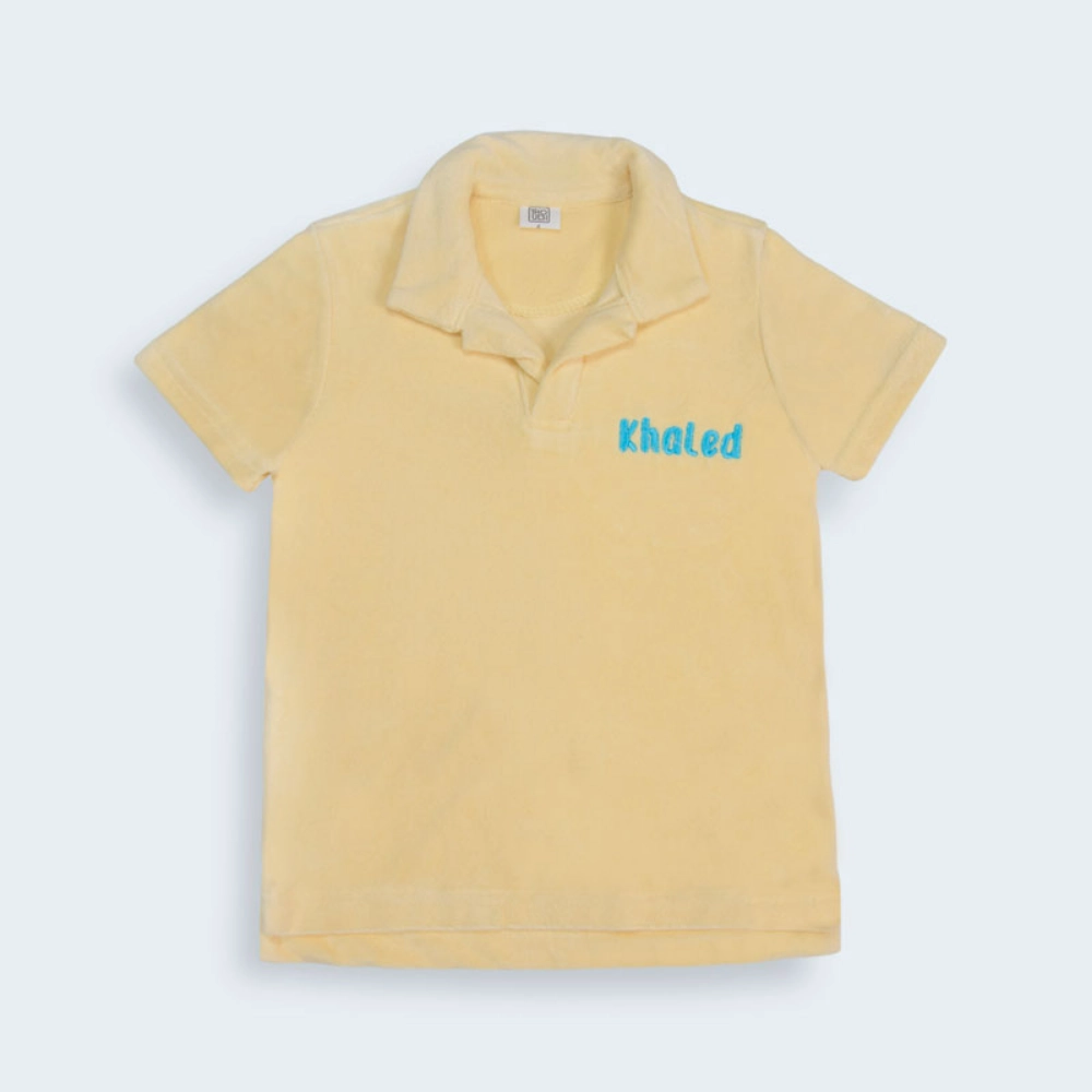 صورة قماش منشفة قميص أصفر (مع امكانية تطريز الاسم)