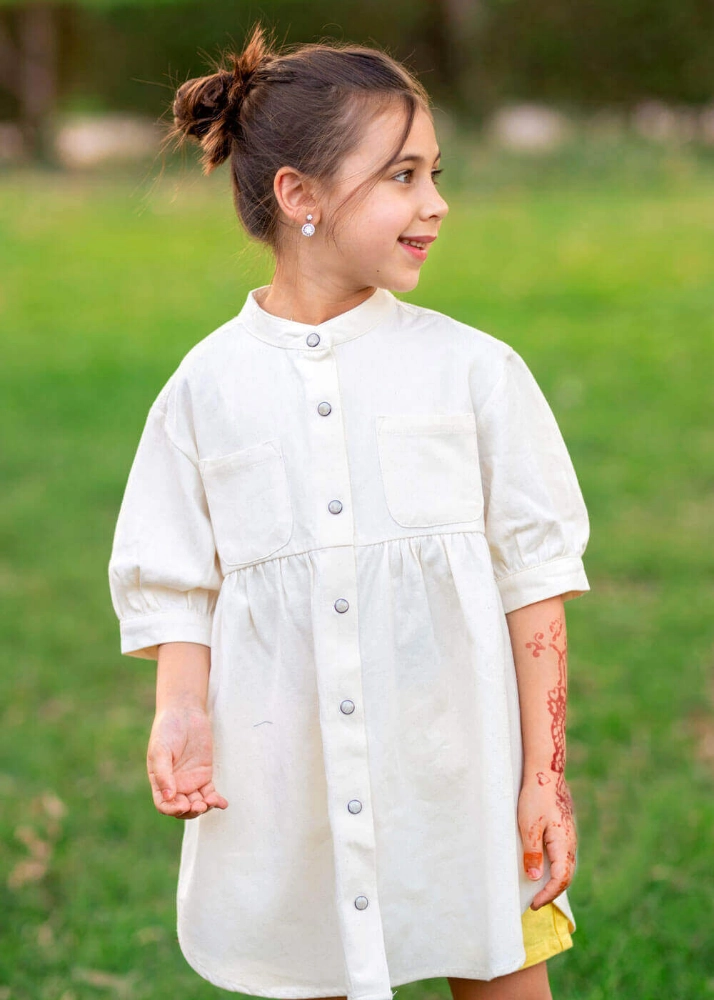 صورة فستان بناتى تيا خام مفرغ لون ابيض قياس